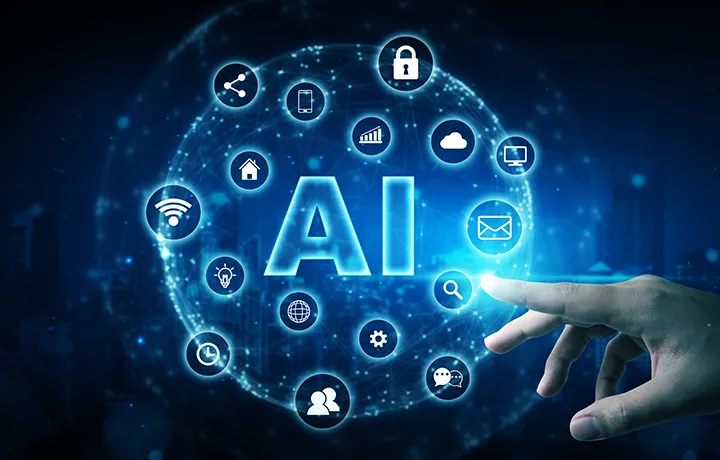 青く光るAIの文字と通信アイコンが浮かぶデジタル空間で、人の手が仮想画面に触れようとしている様子。